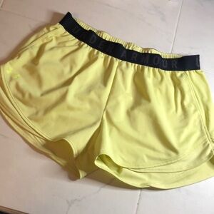 Under armour yellow sports shorts. Loose fit. Heatgear. EUC!